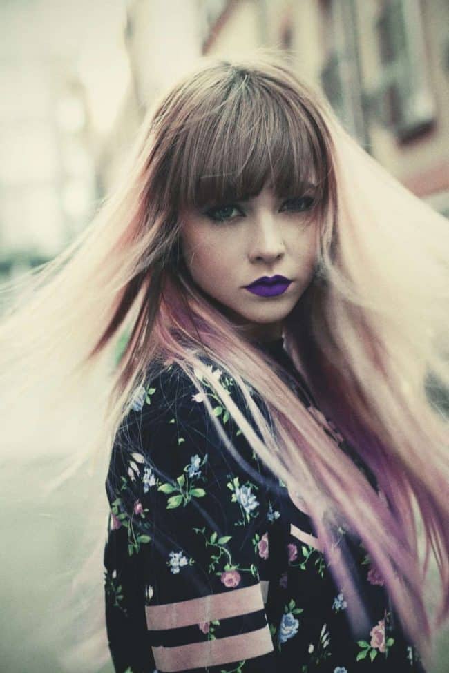 moody woman thinks about john frieda hair dye