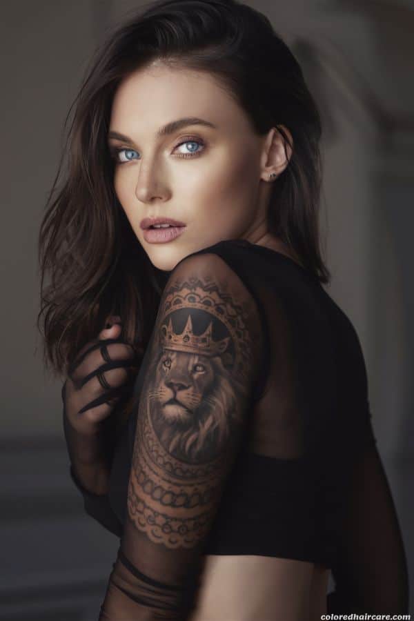 The Best Hair Colors To Make Blue Eyes Really Pop 7 woman with ash brown hair and blue eyes