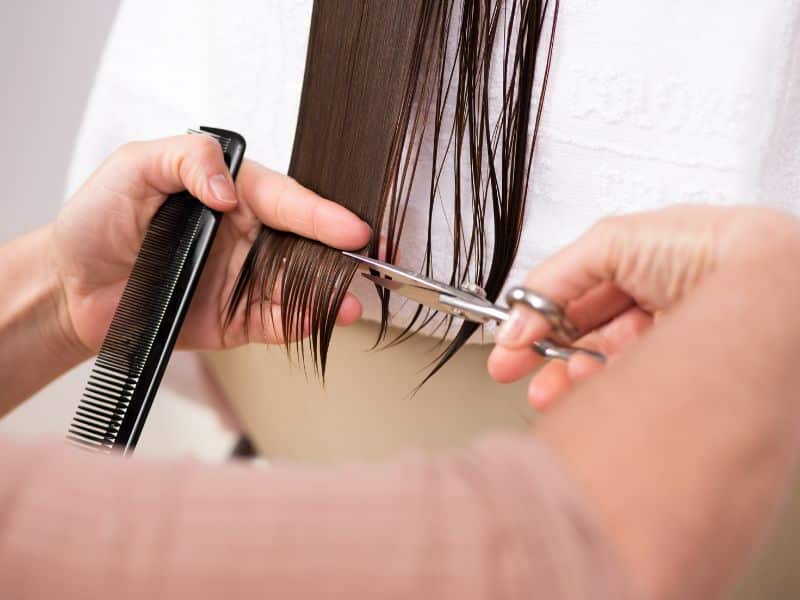 How to Keep Your Hair Happy This Winter – 7 Expert Tips for Every Hair Type 8 hair getting a trim