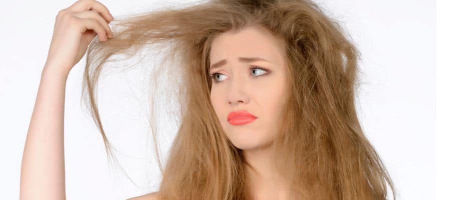 Top 9 Hair Dye Mistakes People Make and How to Avoid Them 7 hair dye mistakes and how to avoid them - a lady with frizzy damaged hair