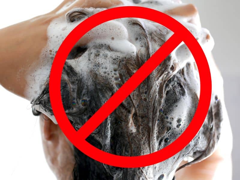 How to Stop Red Hair Dye from Fading with 9 Expert Tips 3 do not wash your hair for 24 hours after dyeing red sign