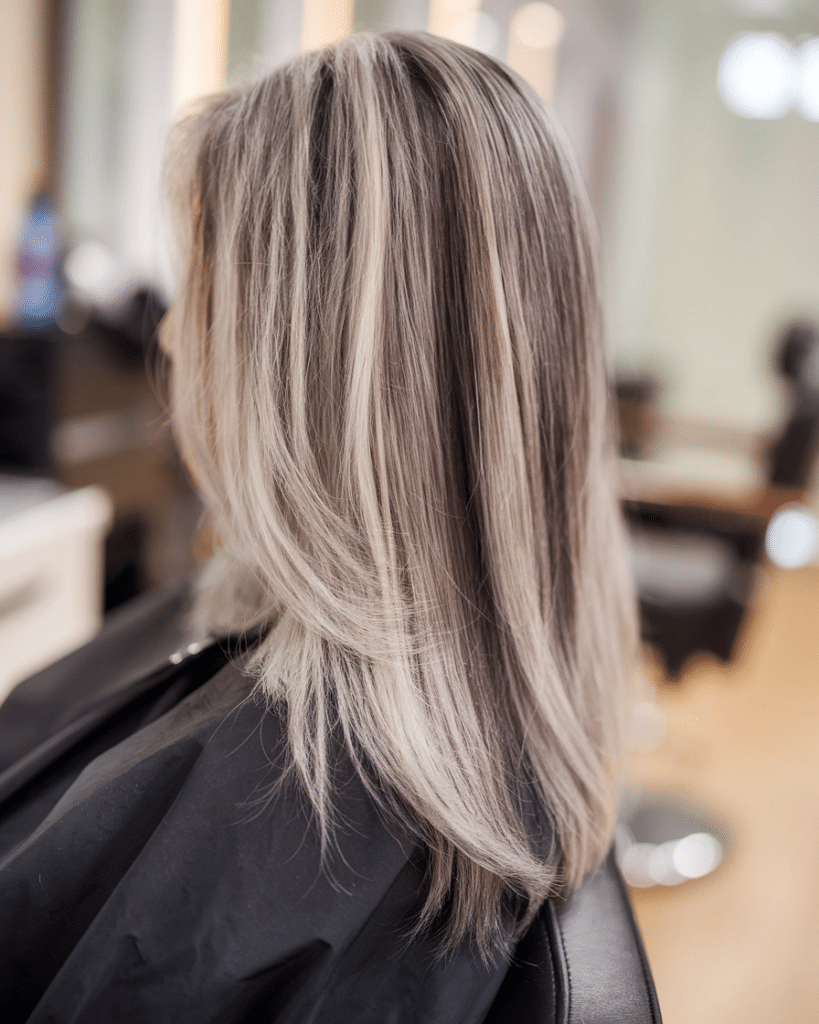 Best Hair Colors for Women Over 60 (2025 Trends + Low-Maintenance Picks) 11 salt and pepper balayage woman over 60