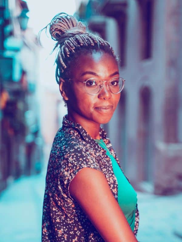 Could Your Hairstyle Make You Richer? The TikTok Trend You Need to Try 3 hair theory woman with hair up in a bun