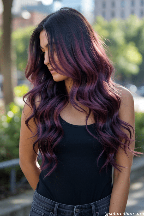 25 Balayage Ideas for Black Hair That Actually Pop (2025 Looks & Tips) 19 Cherry cola balayage with red-brown undertones on black curls