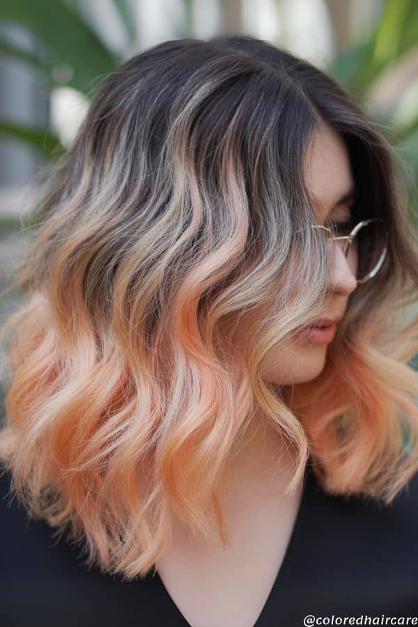 25 Balayage Ideas for Black Hair That Actually Pop (2025 Looks & Tips) 27 Vibrant coral peach balayage on dark black hair